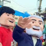 Com boneco cabeçudo, Dimas dá jeito para ter Lula em campanha