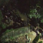 Drone flagra centenas de criminosos fugindo pela mata durante operação da PM