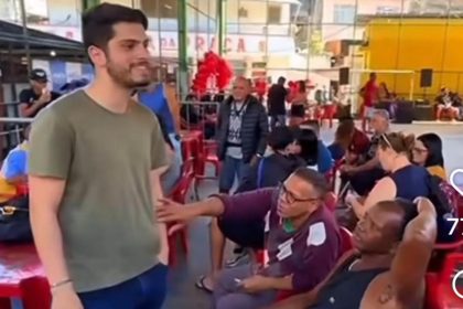 João Drumond em ação social do Instituto Imperatriz Leopoldinense na Favela Nova Brasília, no Complexo do Alemão: neto de Luizinho Drumond está em pré-campanha para deputado estadual