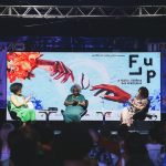 Mesa de debate em evento da Flup