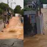 Rua em Xerém, bairro de Duque de Caxias, alagada após rompimento de adutora da Águas do Rio