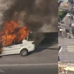 Carro pega fogo na pista lateral da Via Dutra