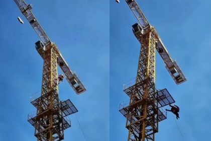 Operador de grua sendo resgatado por bombeiros em Botafogo