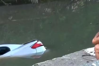 Carro despenca no rio Maracanã