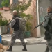 Agentes armados após tiroteio no Rio